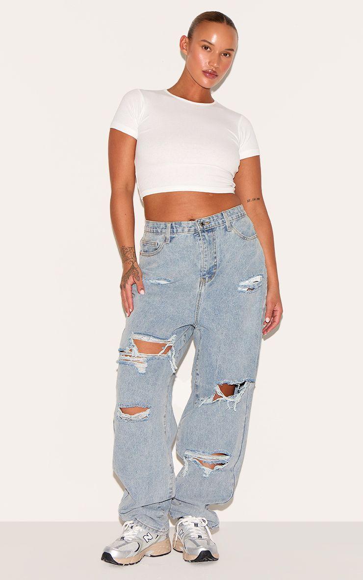 PRETTYLITTLETHING Plus  Ripped Mom Jeans by PRETTYLITTLETHING