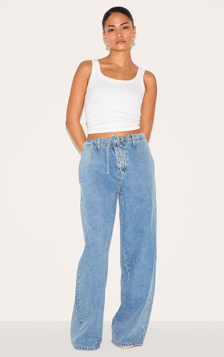 Petite Light Blue Denim Relaxed Drawstring Wide Leg Jeans by PRETTYLITTLETHING
