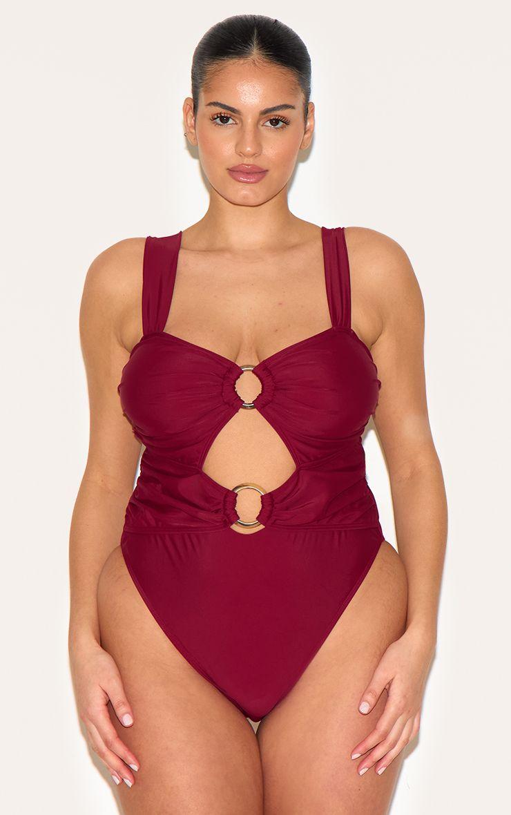 Plus O Ring Ruched Cut Out Swimsuit by PRETTYLITTLETHING Plus O Ring Ruched Cut Out Swimsuit by PRETTYLITTLETHING