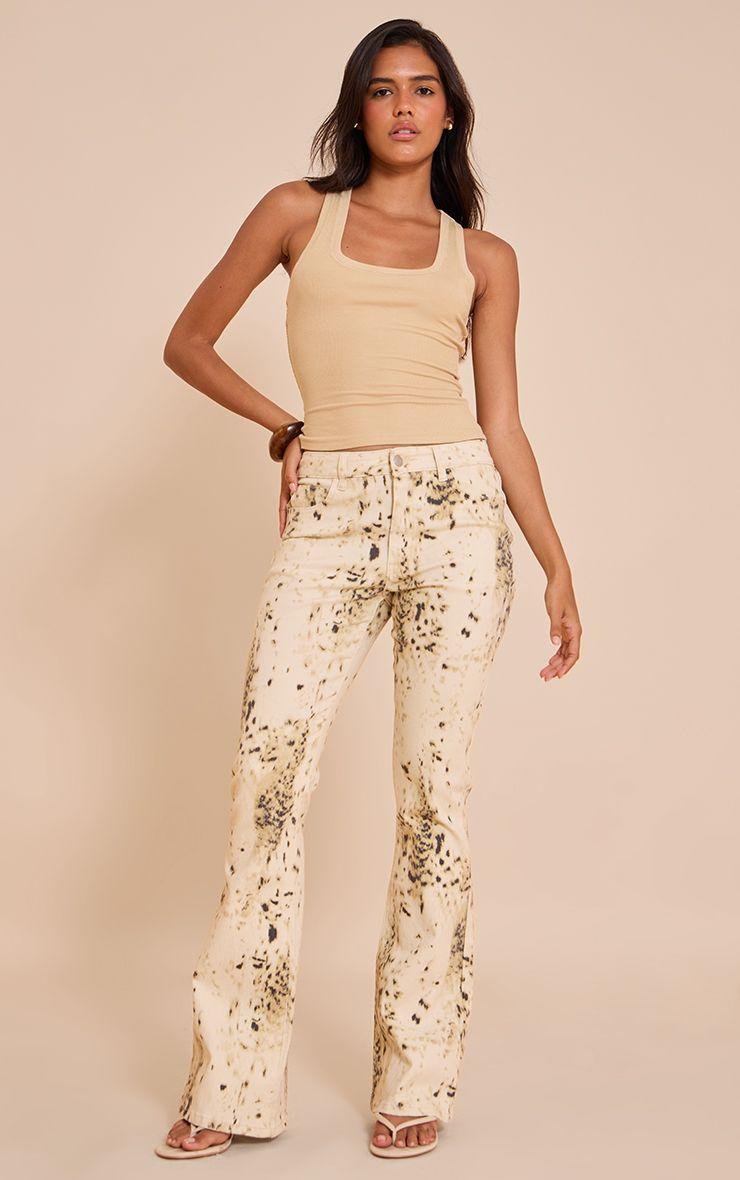 Snow Leopard Flared Jeans by PRETTYLITTLETHING