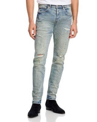 Worn Slashed Paint Jeans in Light Indigo by PURPLE BRAND
