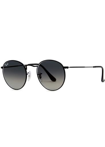 Black round-frame sunglasses by RAY-BAN