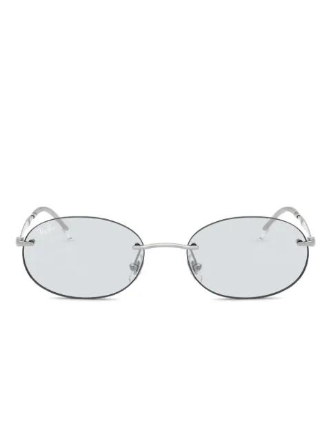 oval-frame glasses by RAY-BAN