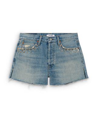 The Breezy Mid Rise Jean Shorts in Aged Worn Blue by RE/DONE