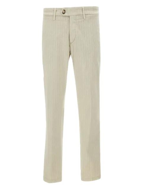 pinstripe-pattern trousers by RE-HASH