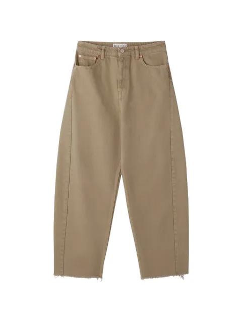 washed curved-leg jeans by RECTO