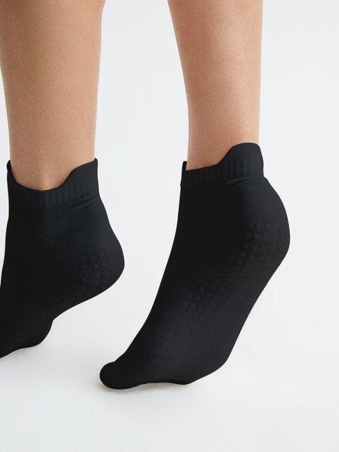 Castore Yoga Ankle Socks in Black by REISS