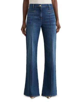 Claude High Rise Pintuck Flare Jeans in Mid Blue by REISS