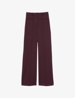 Claude pinched-seam flared-leg high-rise stretch-woven trousers by REISS