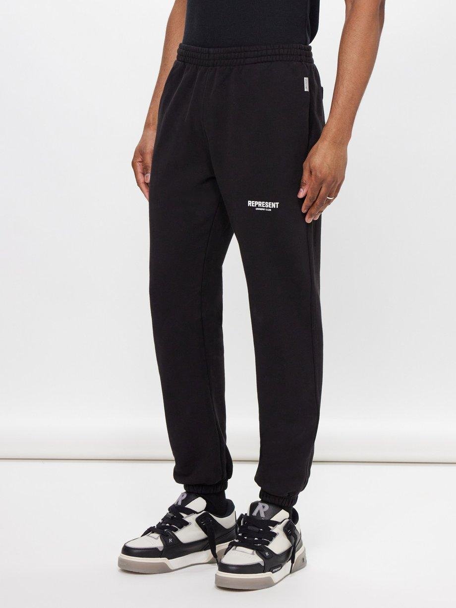 Owners Club-print cotton-jersey track pants by REPRESENT