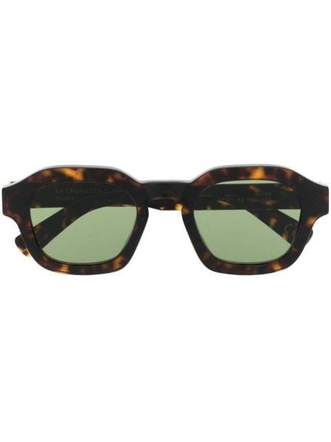 green-tined round-frame sunglasses by RETROSUPERFUTURE