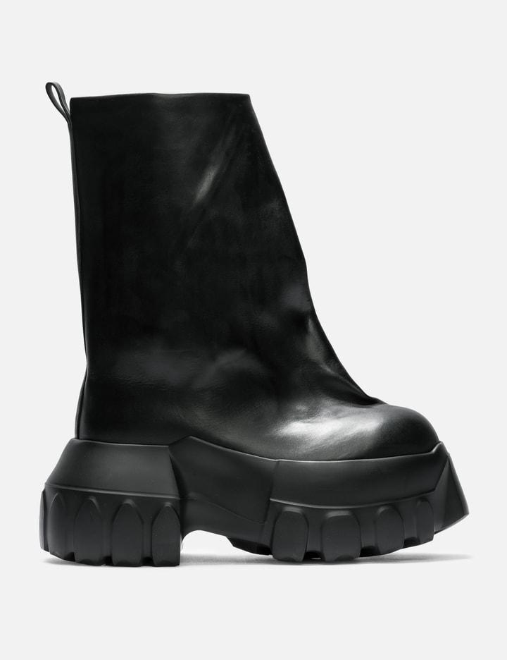 Flared Mega Tractor Boots by RICK OWENS