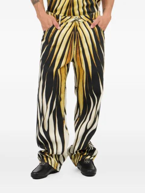 flame-print trousers by ROBERTO CAVALLI