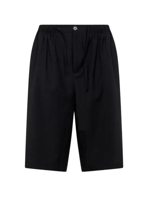 button-fastening shorts by ROSE BURRITO