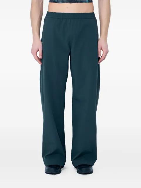 Tommy track pants by RUNNING ORDER