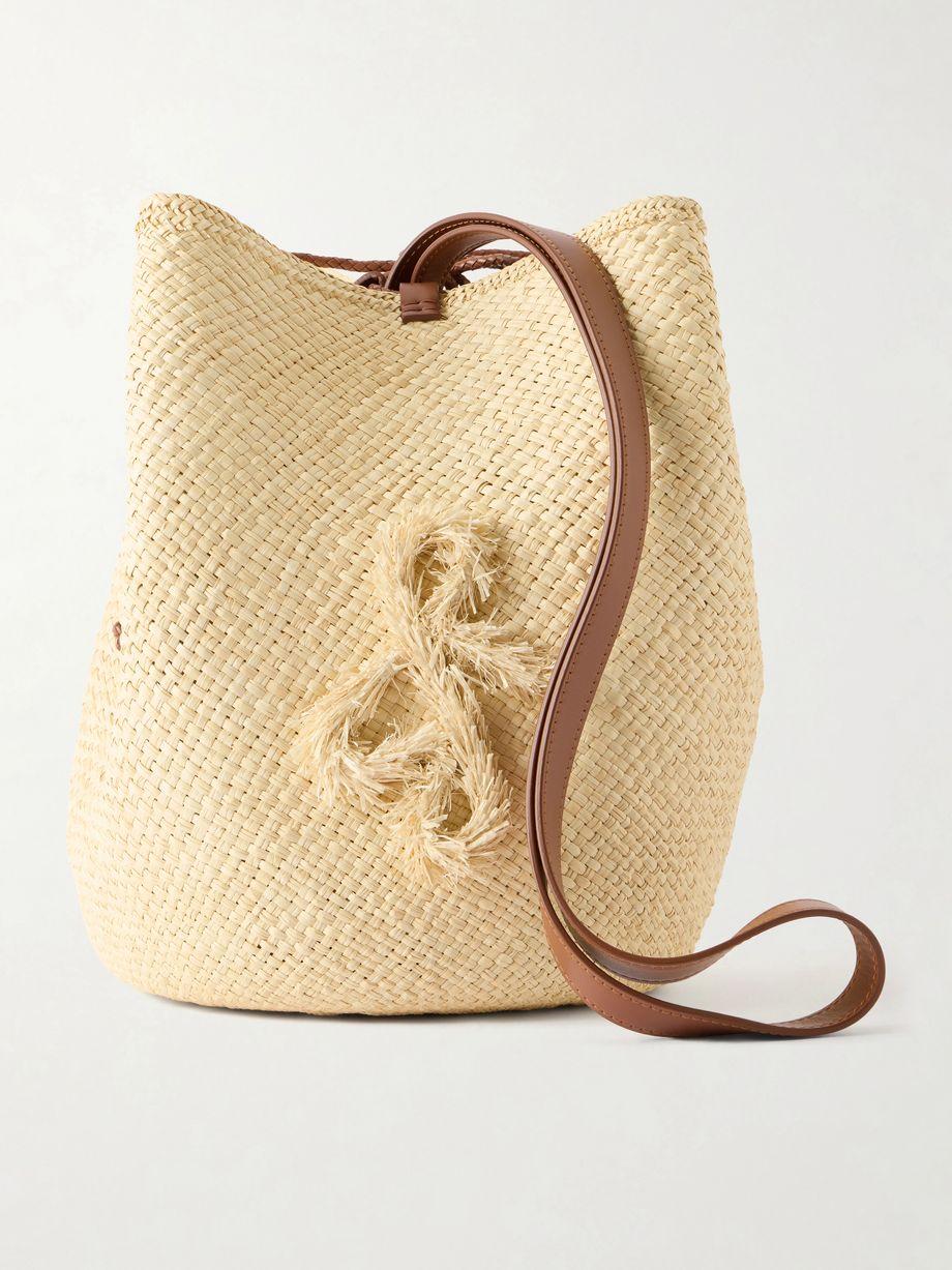 Leather-trimmed straw pouch by RUSLAN BAGINSKIY