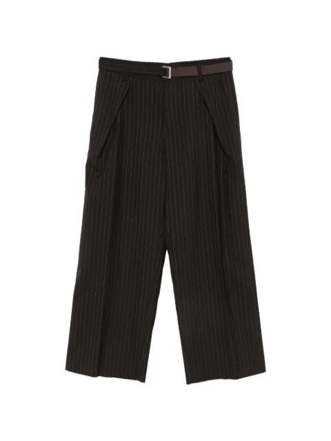 chalk-stripe belted trousers by SACAI