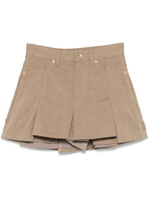 denim mix skorts by SACAI