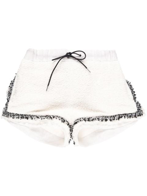 high-waisted tweed shorts by SACAI