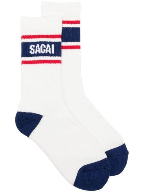 logo-intarsia stripe-detail socks by SACAI
