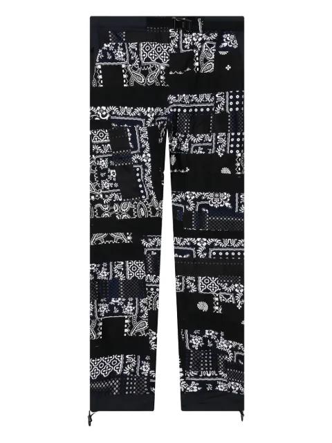 x Hank Willis Thomas patchwork trousers by SACAI