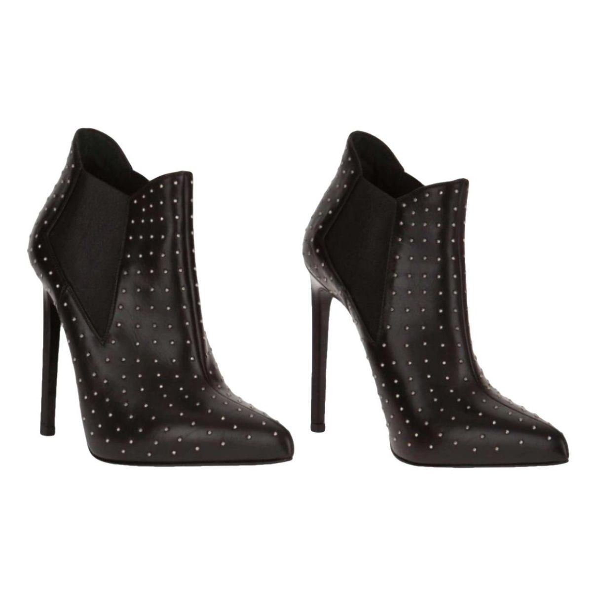 Leather ankle boots by SAINT LAURENT