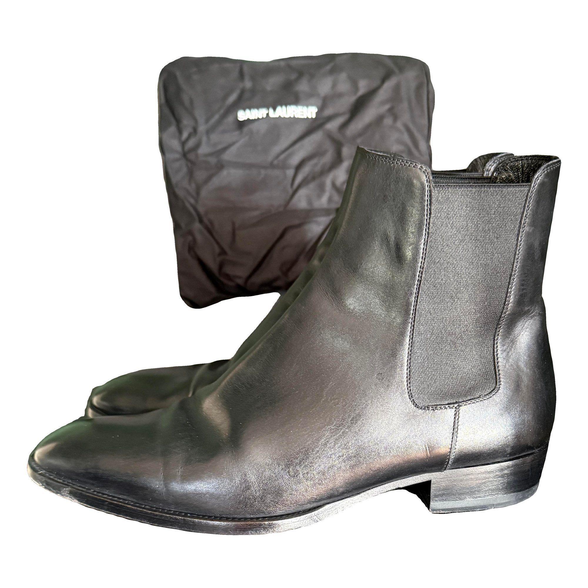 Wyatt leather boots by SAINT LAURENT