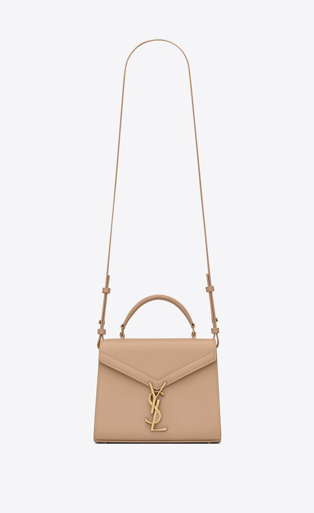 Cassandra mini top handle bag in grain de poudre embossed leather sale