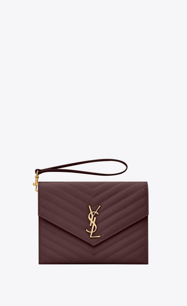 monogram clutch in quilted grain de poudre embossed leather by SAINT LAURENT