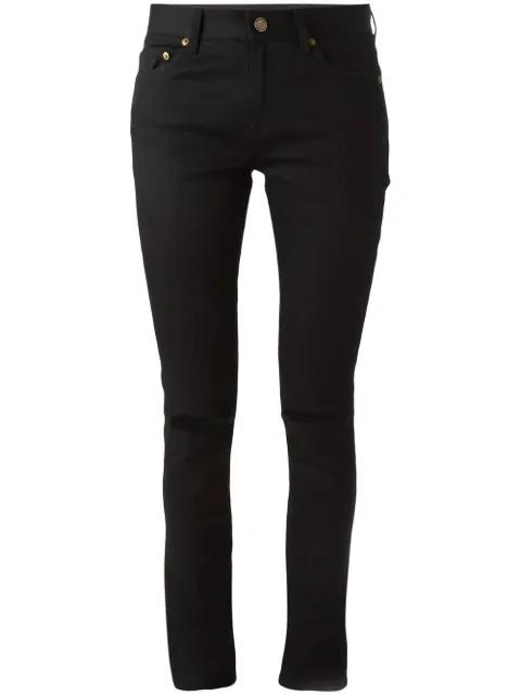 ripped skinny jeans by SAINT LAURENT