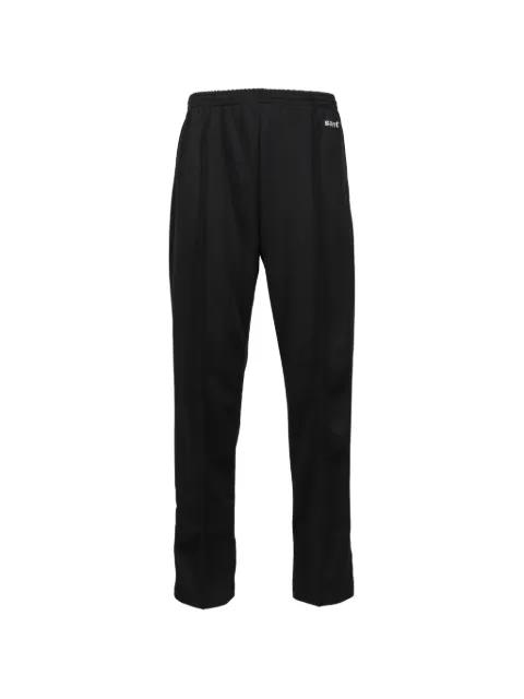 buttoned trousers by SAINT MXXXXXX
