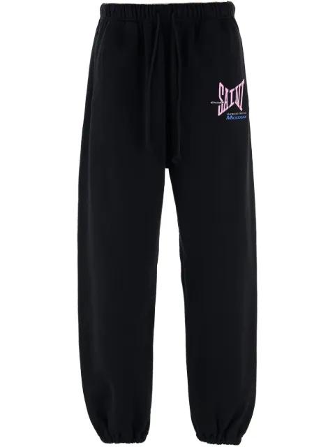 logo-print track pants by SAINT MXXXXXX