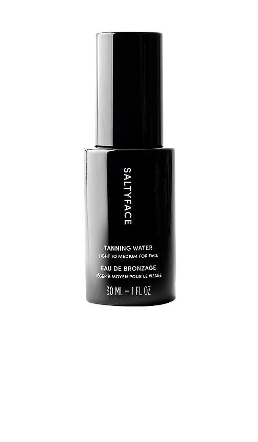 Saltyface Tanning Water in Light To Medium by SALTYFACE