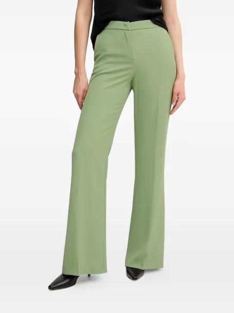 flared trousers by SANDRO FERRONE