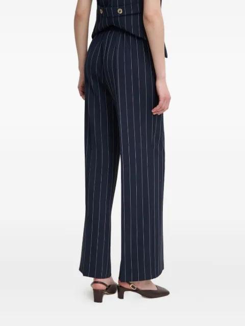 pinstripe side-pocket trousers by SANDRO FERRONE