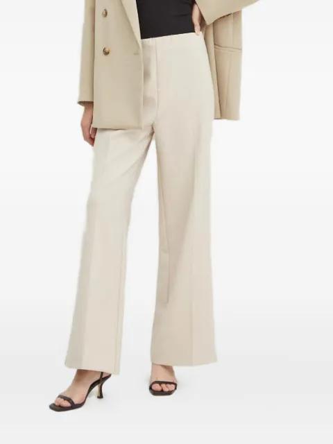 pressed-crease trousers by SANDRO FERRONE