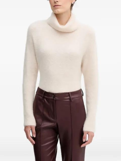 roll neck sweater by SANDRO FERRONE