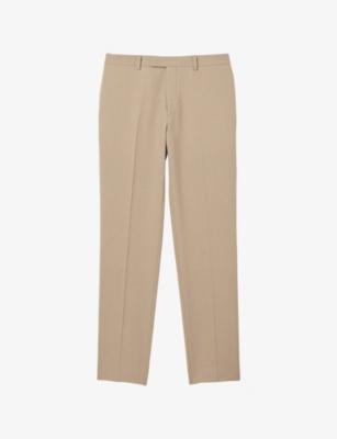 Berkeley slim-fit tapered wool trousers by SANDRO PARIS Berkeley slim-fit tapered wool trousers by SANDRO PARIS