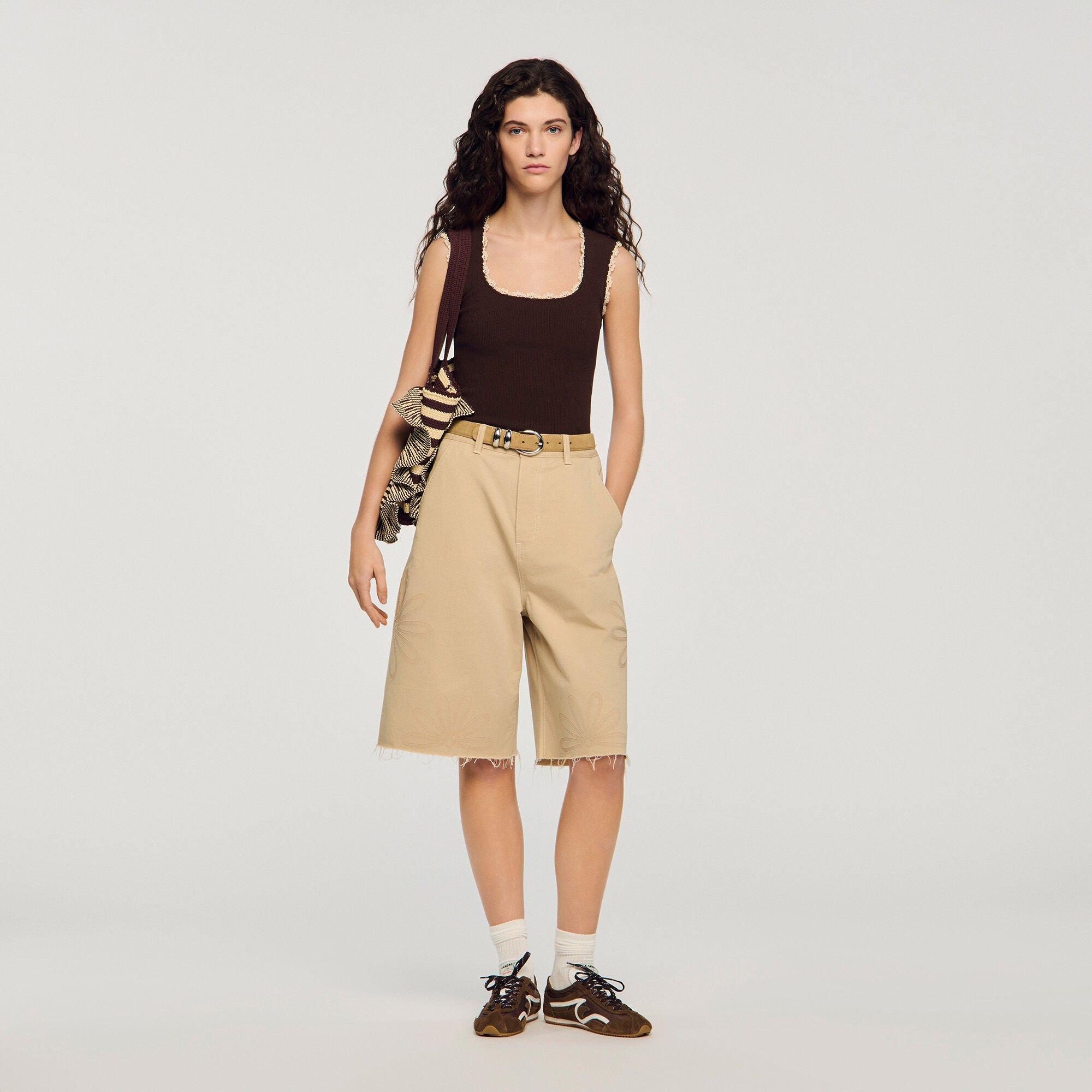 Crochet detail knit top by SANDRO PARIS