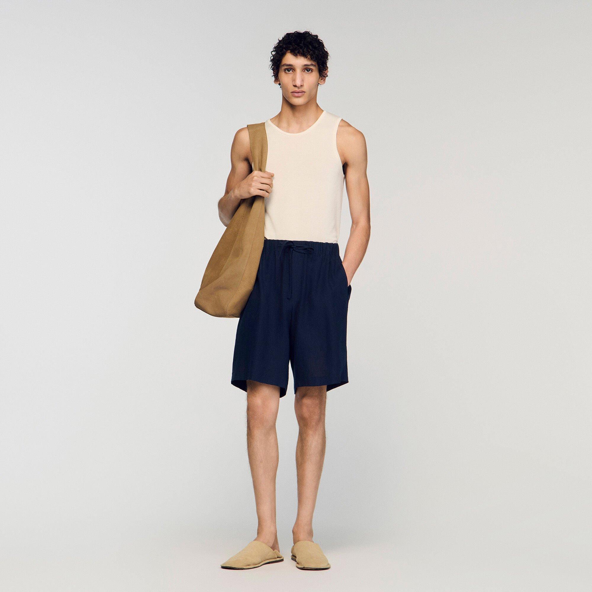 Elastic waist linen shorts by SANDRO PARIS