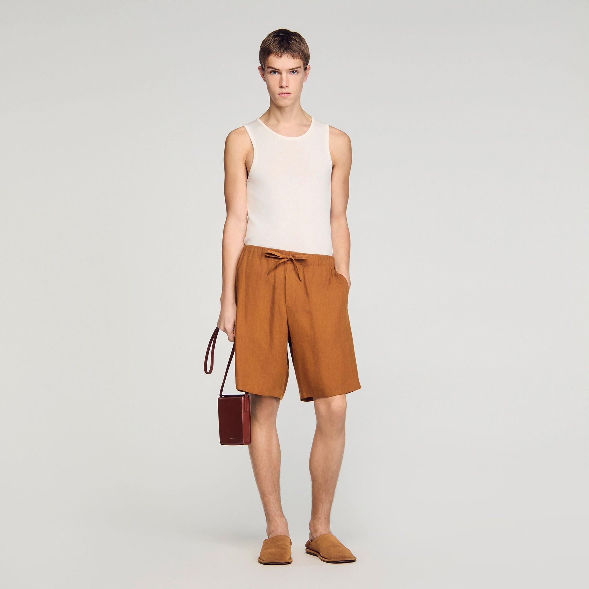 Elastic waist linen shorts by SANDRO PARIS