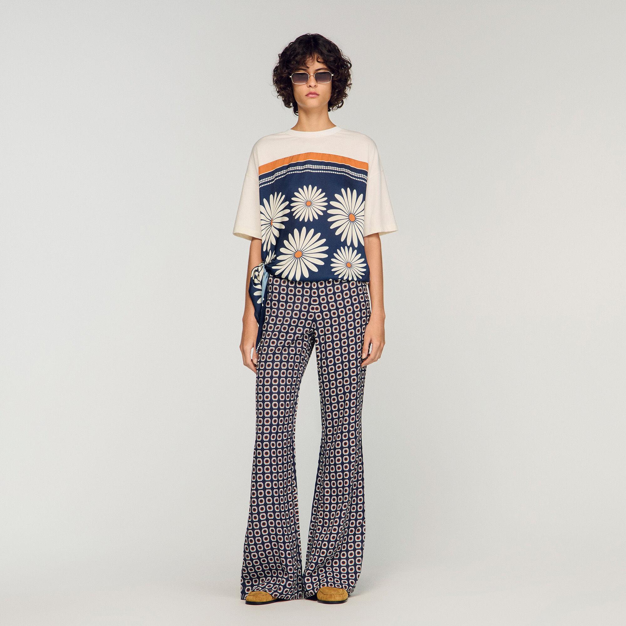 Floral-print flowy trousers by SANDRO PARIS