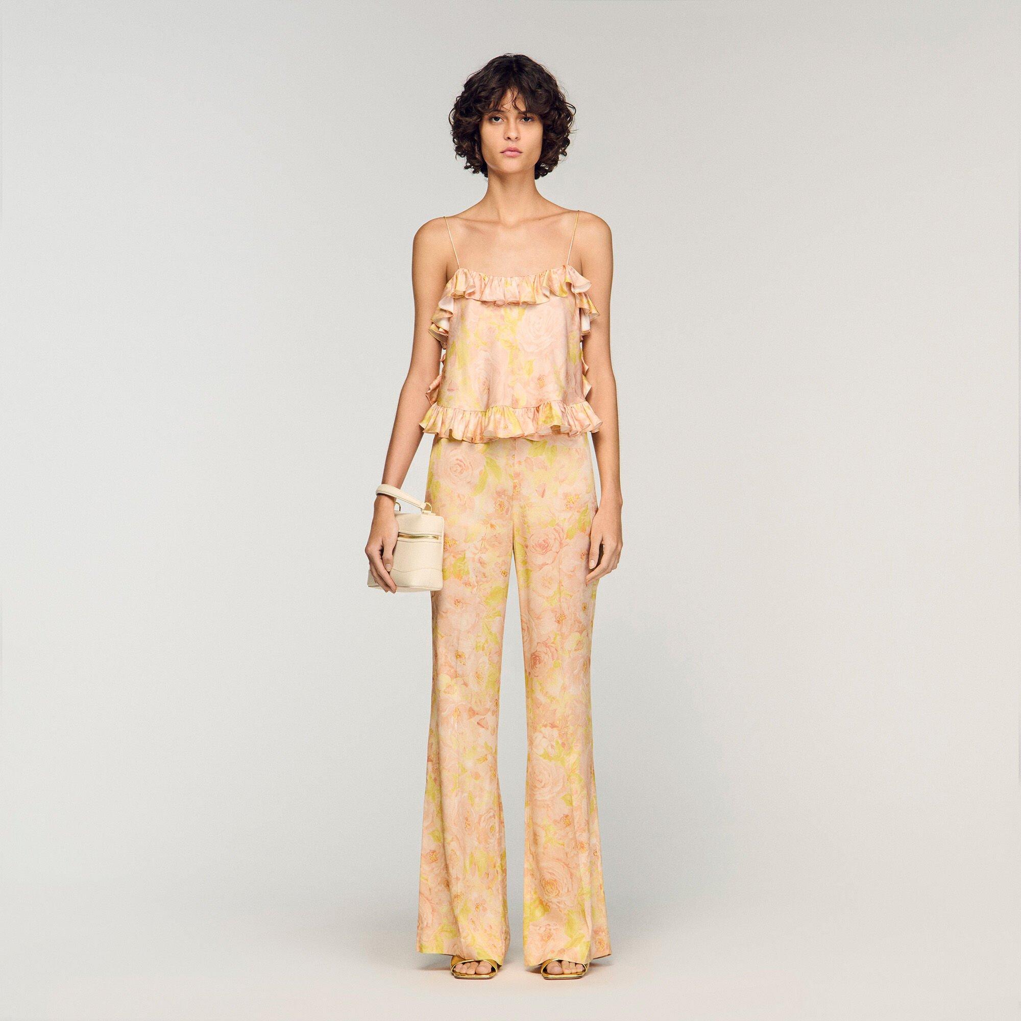 Floral-print flowy trousers by SANDRO PARIS