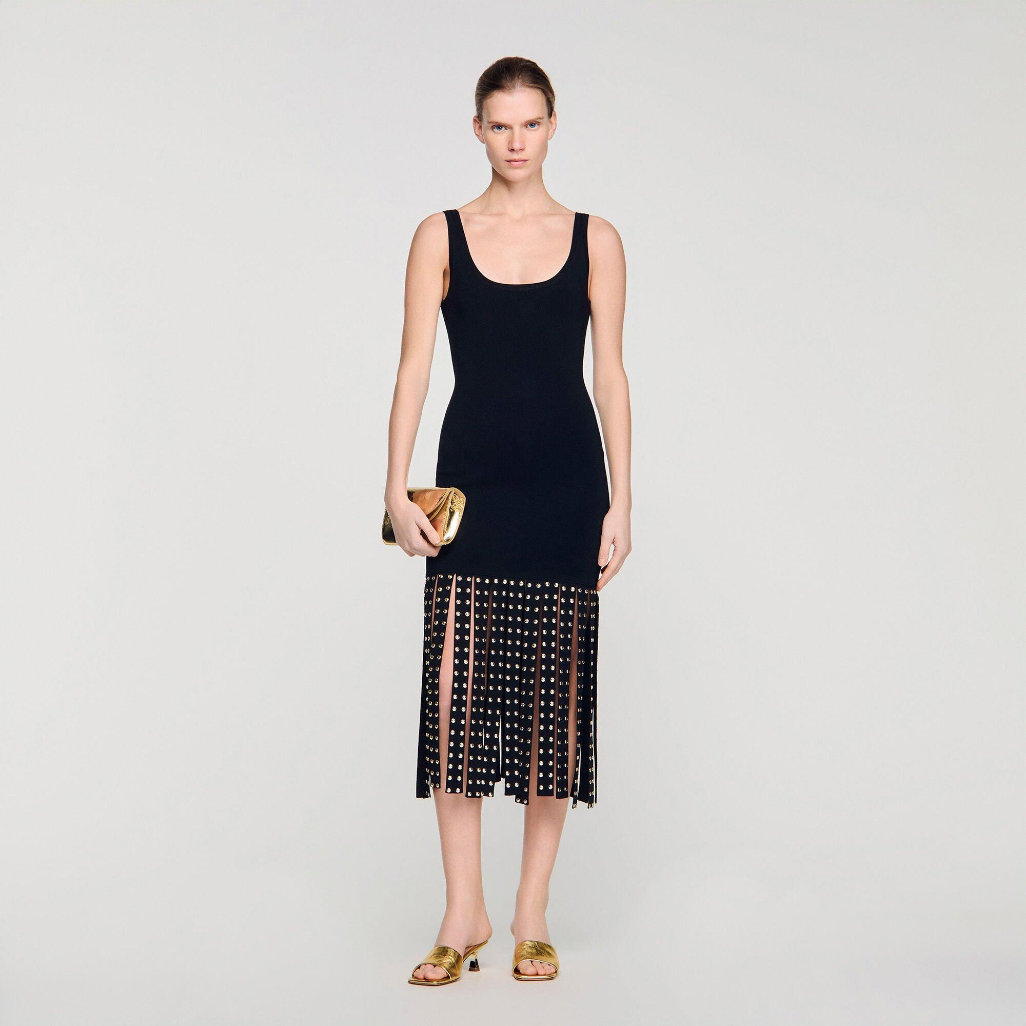 Fringed knit maxi dress by SANDRO PARIS