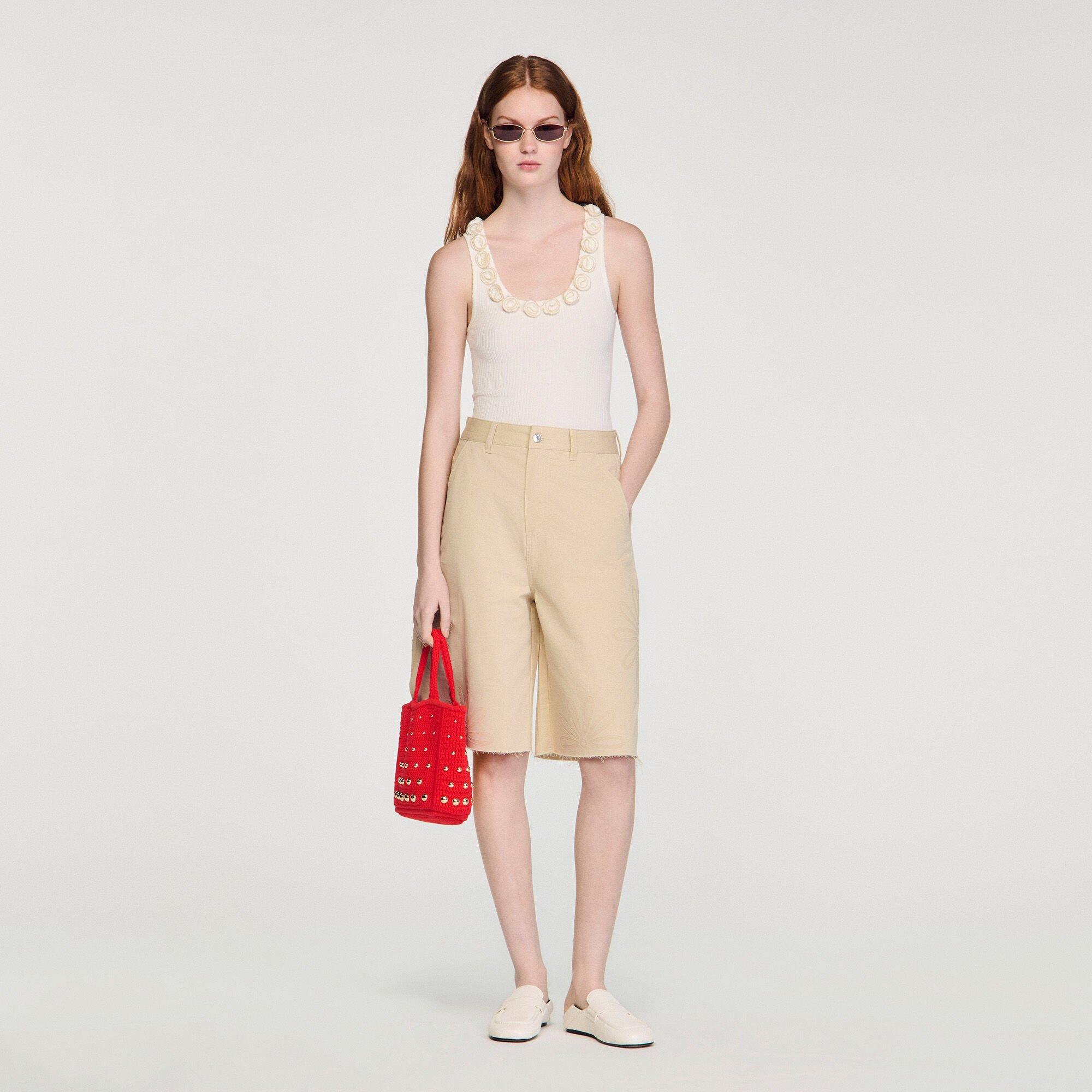 Ribbed knit top with beaded roses by SANDRO PARIS
