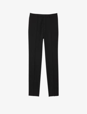 Slim-fit tapered wool trousers by SANDRO PARIS