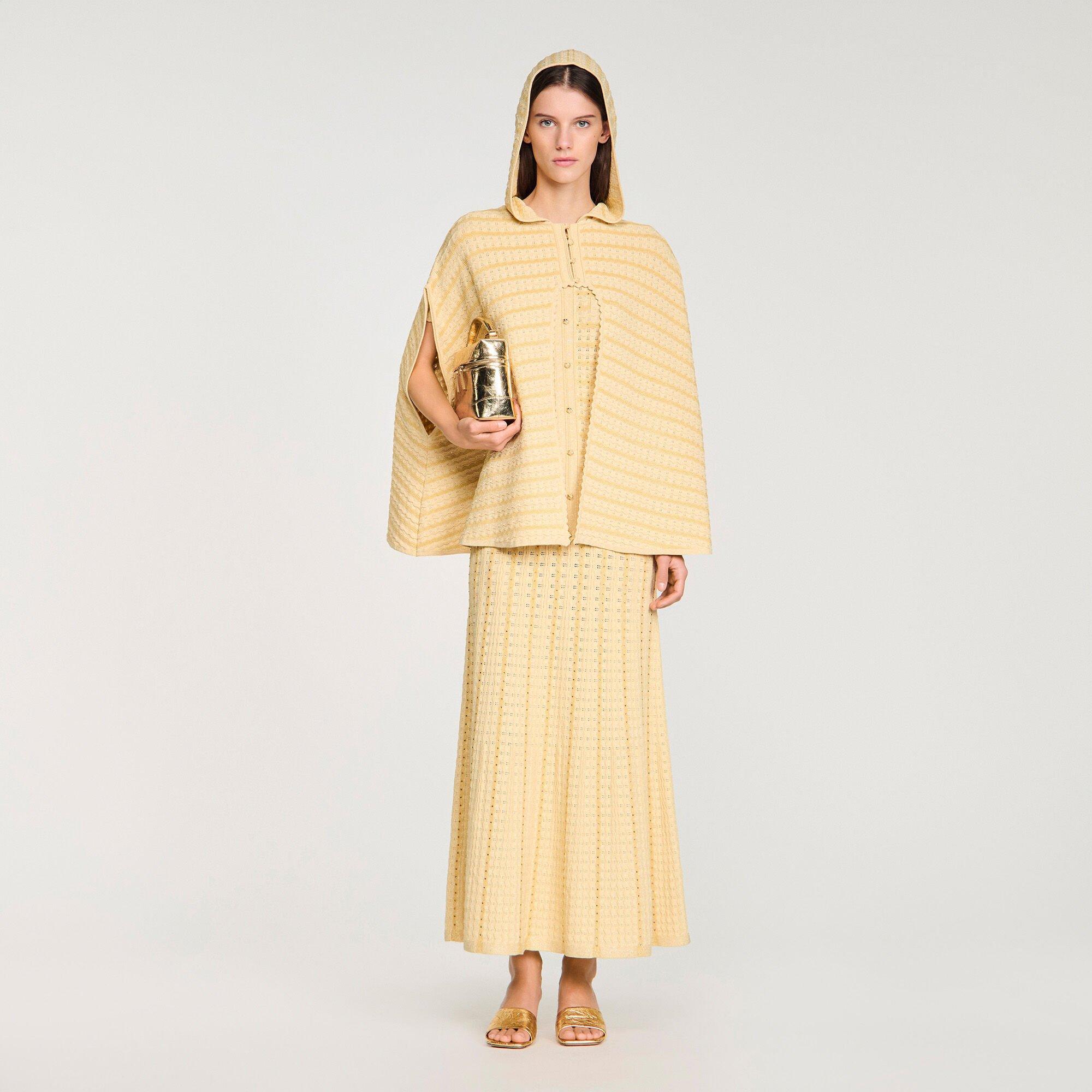 Strass knit cape by SANDRO PARIS