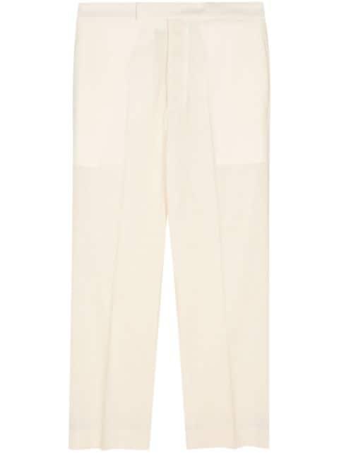 pressed-crease wool tapered trousers by SAPIO