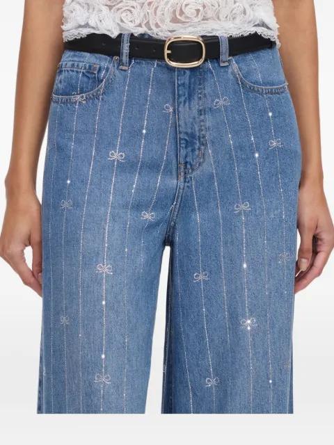 rhinestone-embellished bow-motif jeans by SELF-PORTRAIT