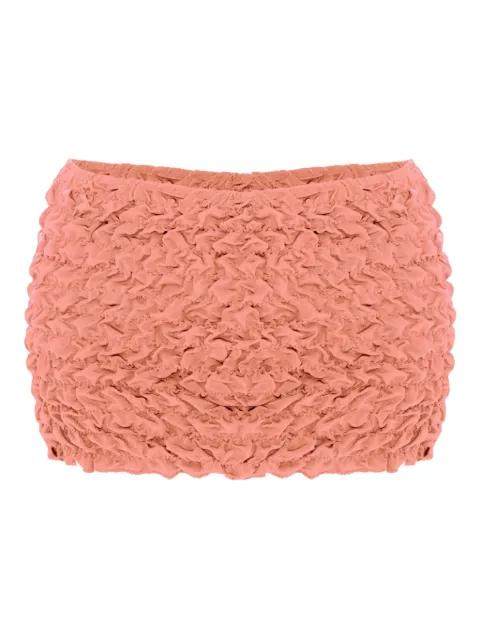 Lia textured mini beach skirt by SELIA RICHWOOD